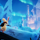 A mouse traverses a frigid landscape while a snowshoe rabbit looms in the distacnce.